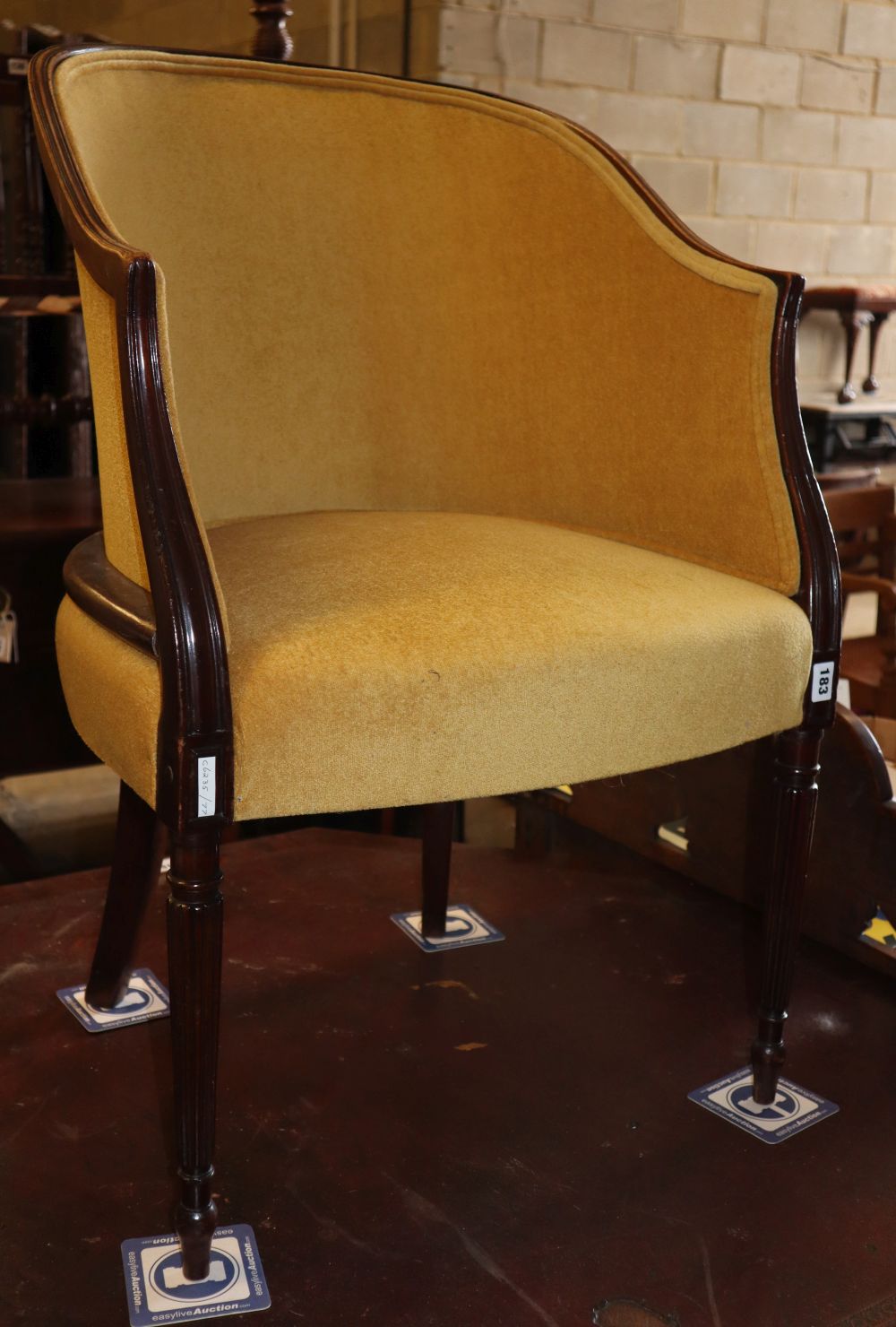 An Edwardian George III style upholstered tub chair, W.58, D.50cm, H.87cm